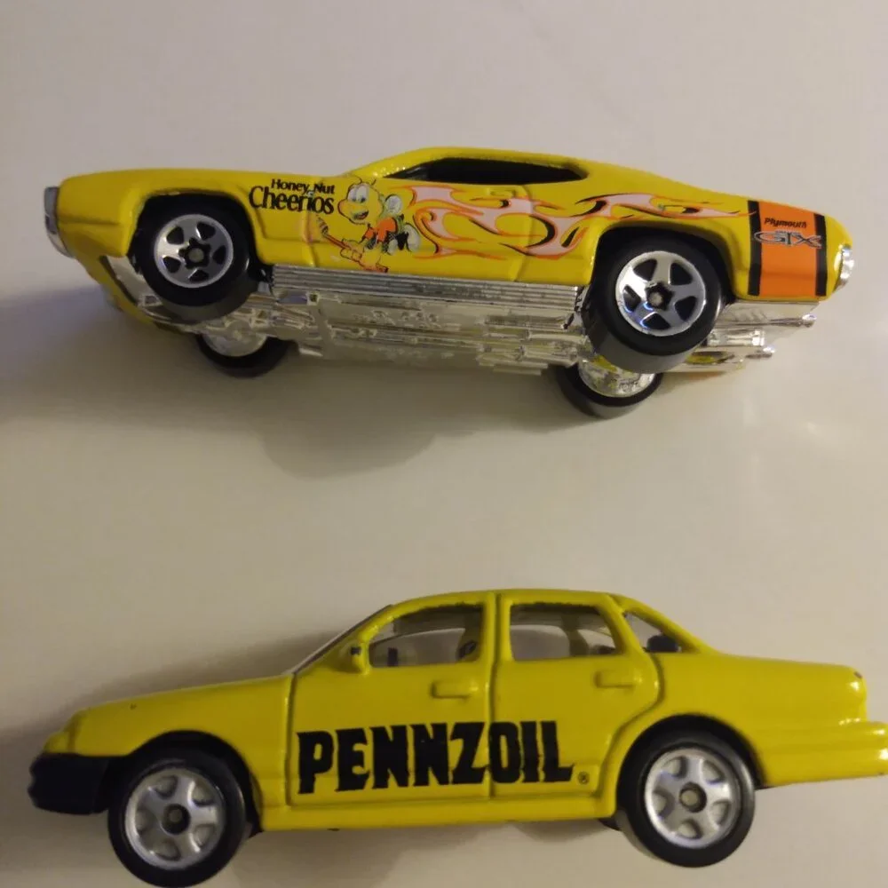 2002 Golden Wheel and 2004 Hot Wheels car
